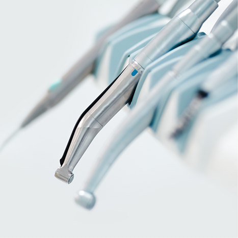 Close up of a row of dental instruments