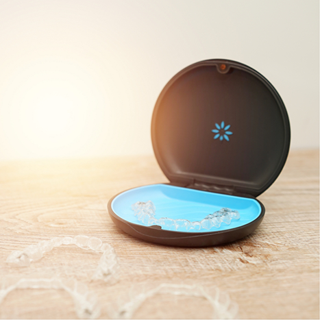 Invisalign clear aligners in their storage case